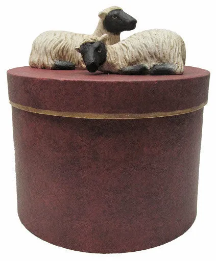 PAIR OF SHEEP ON ROUND BOX